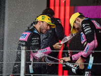 Esteban Ocon and Pierre Gasly of the Alpine F1 Team A524 celebrate their podium during the Formula 1 Grand Prix of Brazil at Autodromo Jose...