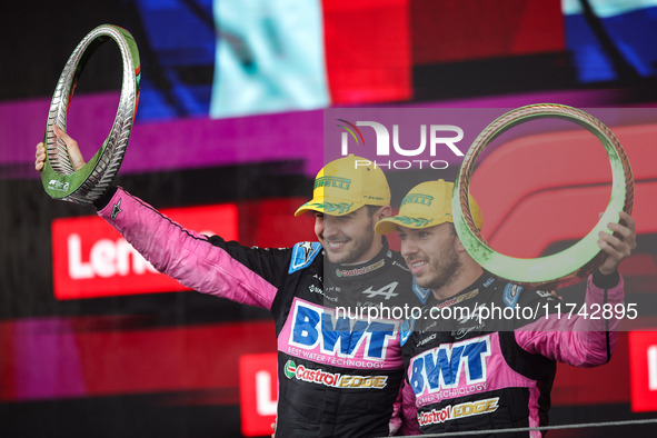 Esteban Ocon and Pierre Gasly of the Alpine F1 Team A524 celebrate their podium during the Formula 1 Grand Prix of Brazil at Autodromo Jose...