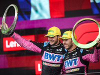 Esteban Ocon and Pierre Gasly of the Alpine F1 Team A524 celebrate their podium during the Formula 1 Grand Prix of Brazil at Autodromo Jose...