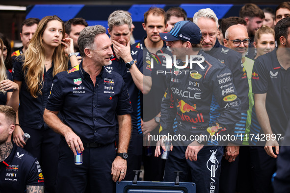 Christian Horner, Team Principal of Red Bull Racing, and Max Verstappen of Red Bull Racing RB20 pose for a portrait during the Formula 1 Gra...