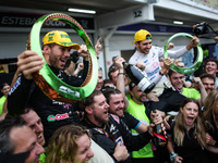 Pierre Gasly and Esteban Ocon of the Alpine F1 Team celebrate the podium with the team during the Formula 1 Grand Prix of Brazil at Autodrom...