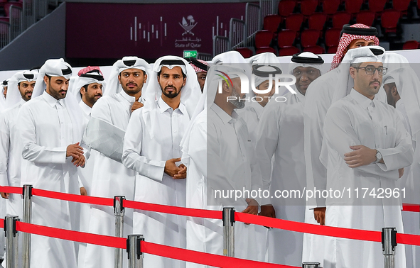 Qatari men wait in long queues to vote at a polling station in Doha, Qatar, on November 5, 2024, to cast their votes in a general referendum...