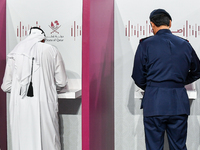 Qatari men cast their votes at a polling station in Doha, Qatar, on November 5, 2024, in a general referendum on constitutional amendments,...