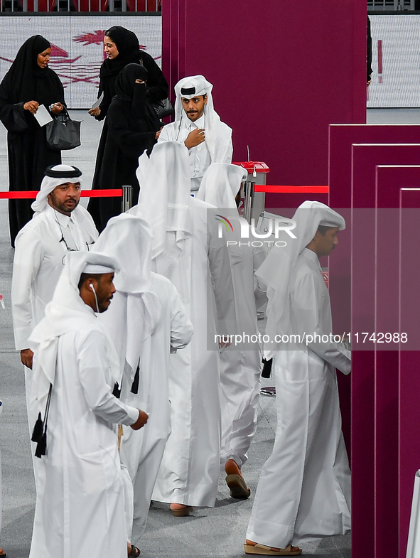 Qatari men cast their votes at a polling station in Doha, Qatar, on November 5, 2024, in a general referendum on constitutional amendments,...