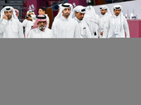 Qatari men arrive at a polling station in Doha, Qatar, on November 5, 2024, to cast their votes in a general referendum on constitutional am...