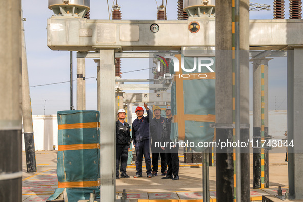 Border police conduct an enterprise safety inspection on a wind power plant in Altay, Xinjiang, China, on November 5, 2024. 