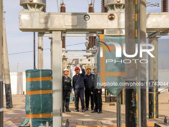 Border police conduct an enterprise safety inspection on a wind power plant in Altay, Xinjiang, China, on November 5, 2024. (