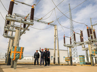 Border police conduct an enterprise safety inspection on a wind power plant in Altay, Xinjiang, China, on November 5, 2024. (