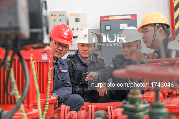 Border police conduct an enterprise safety inspection on a wind power plant in Altay, Xinjiang, China, on November 5, 2024. 