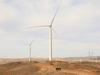 Border police conduct an enterprise safety inspection on a wind power plant in Altay, Xinjiang, China, on November 5, 2024. (