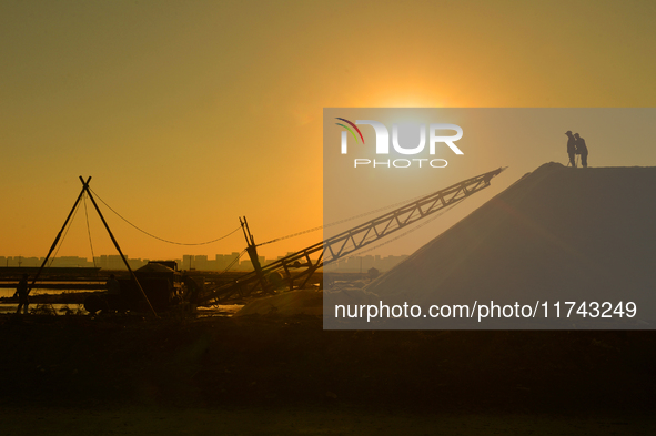 A photo taken on November 5, 2024, shows the sea salt storage yard of the autumn harvest at the Dongfeng Salt Yard of Hetao Street in the Ch...