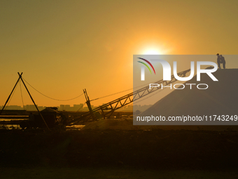 A photo taken on November 5, 2024, shows the sea salt storage yard of the autumn harvest at the Dongfeng Salt Yard of Hetao Street in the Ch...