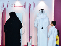 Qatari voters cast their electronic votes at a polling station in Doha, Qatar, on November 5, 2024, in a general referendum on constitutiona...