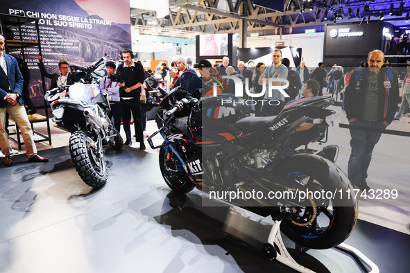 A general view of a motorcycle display at the BMW stand during the inauguration of the 110th edition of EICMA Milan Motorcycle Show at Rho F...