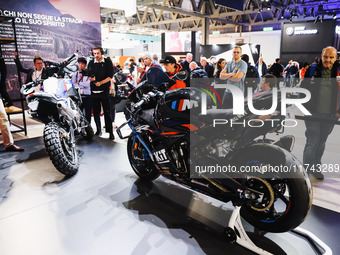 A general view of a motorcycle display at the BMW stand during the inauguration of the 110th edition of EICMA Milan Motorcycle Show at Rho F...