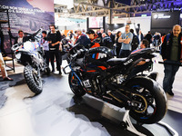 A general view of a motorcycle display at the BMW stand during the inauguration of the 110th edition of EICMA Milan Motorcycle Show at Rho F...