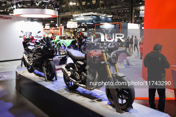 A general view of a motorcycle display at the Lenovo stand during the inauguration of the 110th edition of the EICMA Milan Motorcycle Show a...