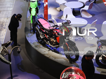 A general view of a motorcycle display at the Lenovo stand during the inauguration of the 110th edition of the EICMA Milan Motorcycle Show a...