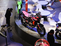 A general view of a motorcycle display at the Lenovo stand during the inauguration of the 110th edition of the EICMA Milan Motorcycle Show a...