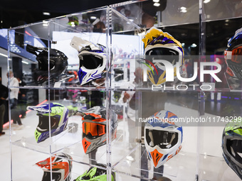 A general view of a motorcycle display at the Airoh stand during the inauguration of the 110th edition of the EICMA Milan Motorcycle Show at...