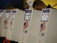 Americans cast their ballots in the presidential election in downtown New York, United States, on November 5, 2024, at the Institute of Art...