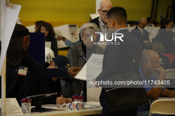 Americans cast their ballots in the presidential election in downtown New York, United States, on November 5, 2024, at the Institute of Art...