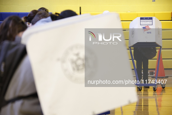 Americans cast their ballots in the presidential election in downtown New York, United States, on November 5, 2024, at the Institute of Art...