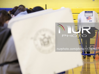 Americans cast their ballots in the presidential election in downtown New York, United States, on November 5, 2024, at the Institute of Art...