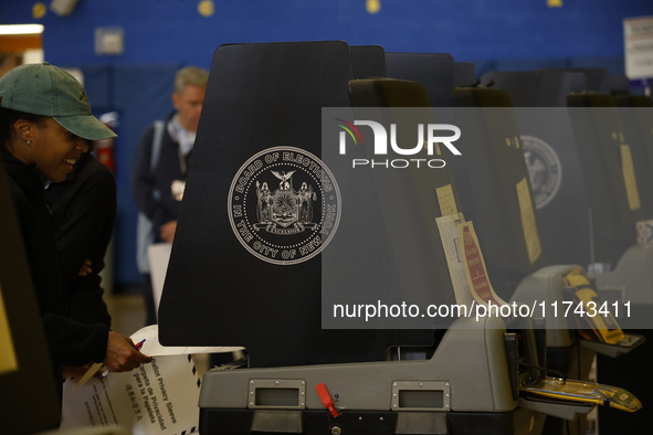 Americans cast their ballots in the presidential election in downtown New York, United States, on November 5, 2024, at the Institute of Art...