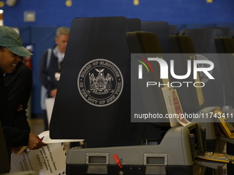 Americans cast their ballots in the presidential election in downtown New York, United States, on November 5, 2024, at the Institute of Art...