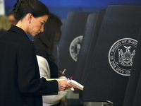 Americans cast their ballots in the presidential election in downtown New York, United States, on November 5, 2024, at the Institute of Art...