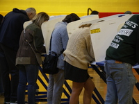 Americans cast their ballots in the presidential election in downtown New York, United States, on November 5, 2024, at the Institute of Art...