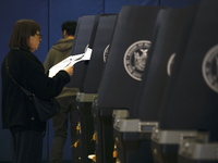 Americans cast their ballots in the presidential election in downtown New York, United States, on November 5, 2024, at the Institute of Art...