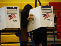 Americans cast their ballots in the presidential election in downtown New York, United States, on November 5, 2024, at the Institute of Art...