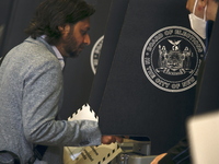 Americans cast their ballots in the presidential election in downtown New York, United States, on November 5, 2024, at the Institute of Art...