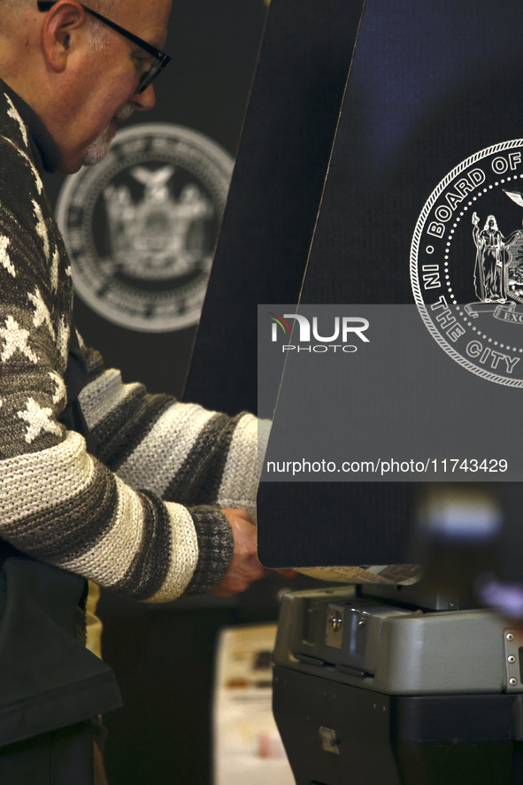 Americans cast their ballots in the presidential election in downtown New York, United States, on November 5, 2024, at the Institute of Art...