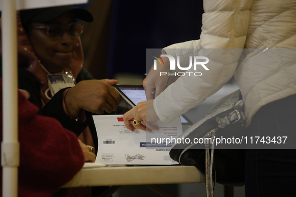 Americans cast their ballots in the presidential election in downtown New York, United States, on November 5, 2024, at the Institute of Art...