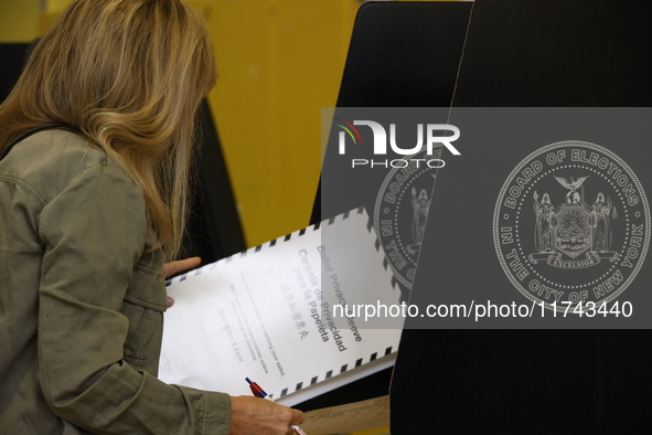 Americans cast their ballots in the presidential election in downtown New York, United States, on November 5, 2024, at the Institute of Art...