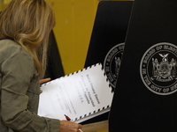 Americans cast their ballots in the presidential election in downtown New York, United States, on November 5, 2024, at the Institute of Art...