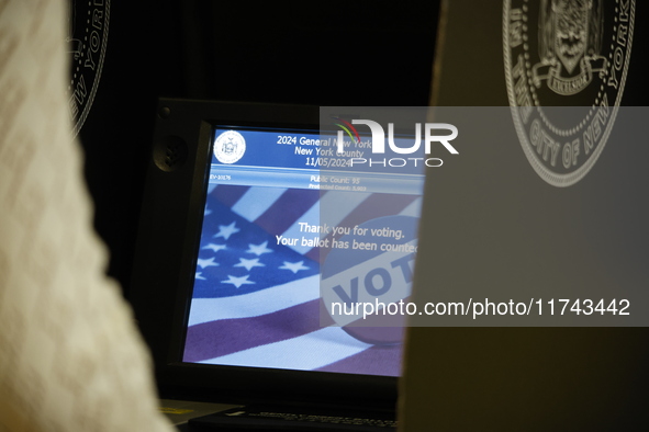 Americans cast their ballots in the presidential election in downtown New York, United States, on November 5, 2024, at the Institute of Art...