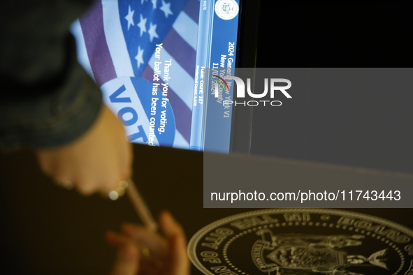 Americans cast their ballots in the presidential election in downtown New York, United States, on November 5, 2024, at the Institute of Art...