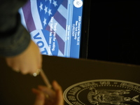 Americans cast their ballots in the presidential election in downtown New York, United States, on November 5, 2024, at the Institute of Art...