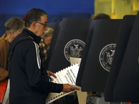 Americans cast their ballots in the presidential election in downtown New York, United States, on November 5, 2024, at the Institute of Art...