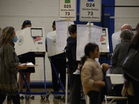 Americans cast their ballots in the presidential election in downtown New York, United States, on November 5, 2024, at the Institute of Art...