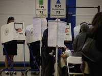 Americans cast their ballots in the presidential election in downtown New York, United States, on November 5, 2024, at the Institute of Art...