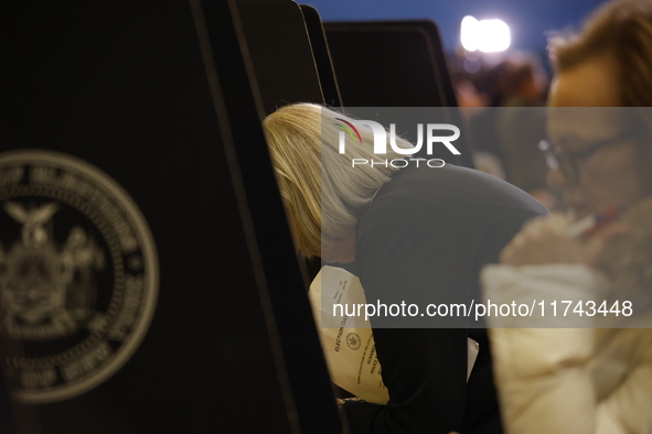 Americans cast their ballots in the presidential election in downtown New York, United States, on November 5, 2024, at the Institute of Art...