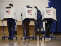 Americans cast their ballots in the presidential election in downtown New York, United States, on November 5, 2024, at the Institute of Art...