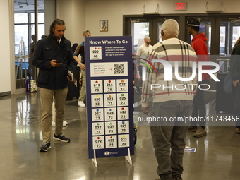 Americans cast their ballots in the presidential election in downtown New York, United States, on November 5, 2024, at the Institute of Art...