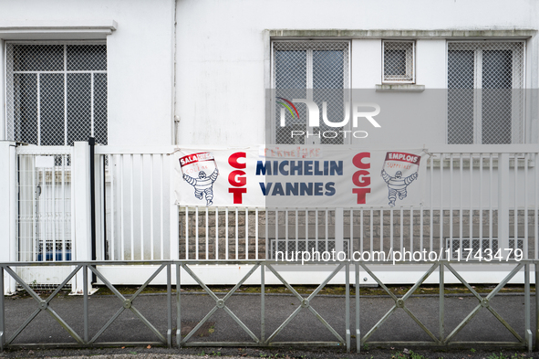 A CGT union banner reads ''closure, angry employees, job losses'' in front of the Michelin plant in Vannes, France, on November 5, 2024. Mic...