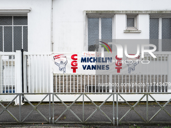 A CGT union banner reads ''closure, angry employees, job losses'' in front of the Michelin plant in Vannes, France, on November 5, 2024. Mic...